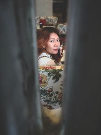 Portrait of woman sitting in restaurant