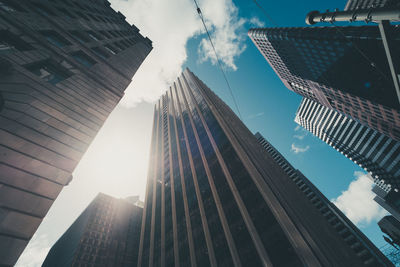 Low angle view of skyscrapers against sky