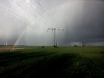 Electricity pylon on field