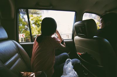 Woman sitting in train