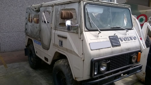 View of old car parked on street