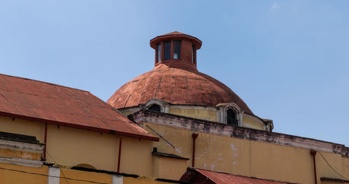 Low angle view of old building against sky
