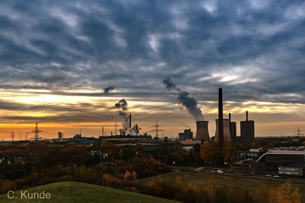 FACTORY AGAINST SKY DURING SUNSET