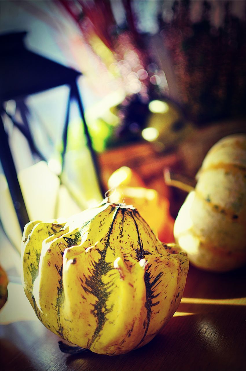 close-up, indoors, still life, focus on foreground, food and drink, table, food, freshness, healthy eating, art, no people, selective focus, art and craft, creativity, fruit, glass - material, single object, day, pumpkin, human representation