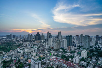 High angle view of city at sunset