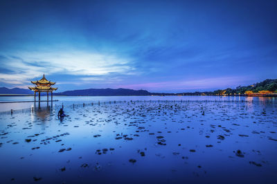 Scenic view of sea against sky during sunset