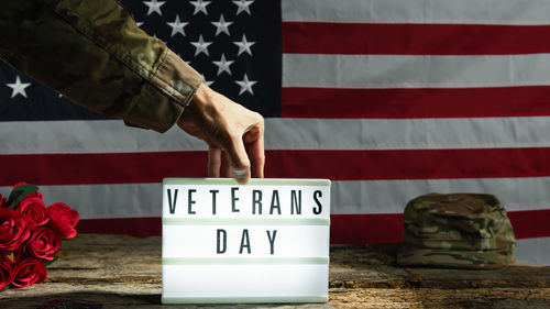 Close-up of hand holding american flag