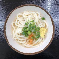 High angle view of pasta in plate on table