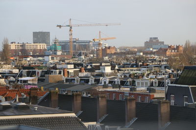 Cityscape against clear sky