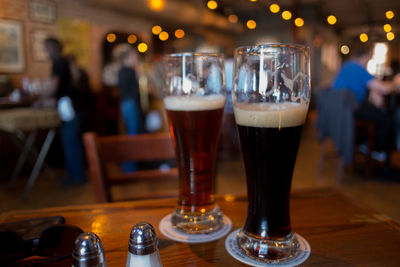 Close-up of beer glass on table
