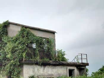 Low angle view of old building against sky