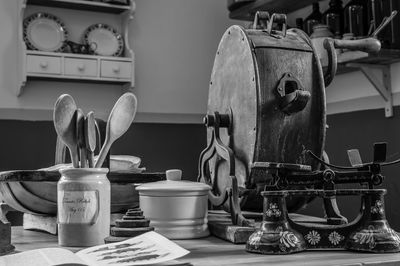 Close-up of kitchen utensils on table