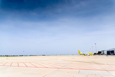 View of airport runway against sky