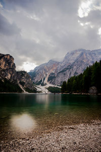 Scenic view of lake and mountains against sky