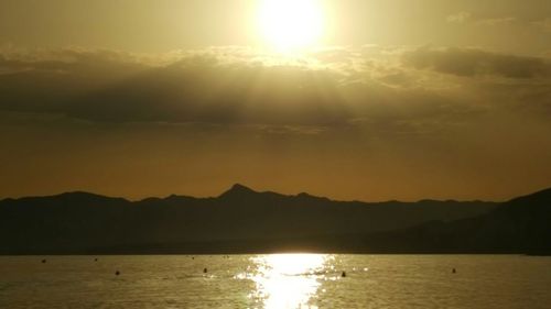 Scenic view of sea at sunset