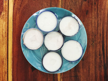 High angle view of eggs in plate on table