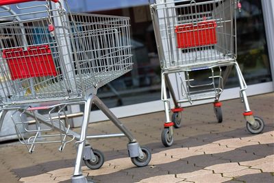 Empty shopping cart outside mall