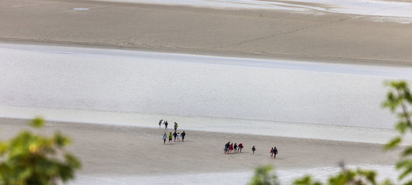 People walking on beach