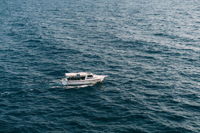 High angle view of ship sailing in sea