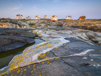 Buildings on rocky coast