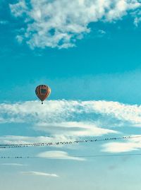 Hot air balloons flying in sky