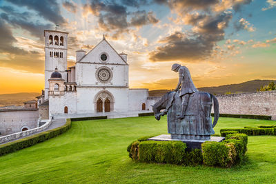 Statue against sky during sunset