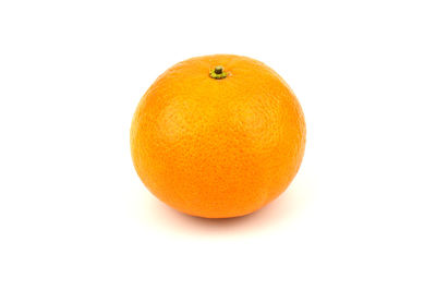 Close-up of orange against white background