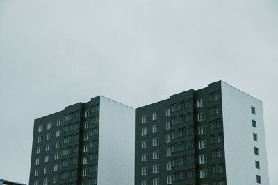 Low angle view of modern building against sky