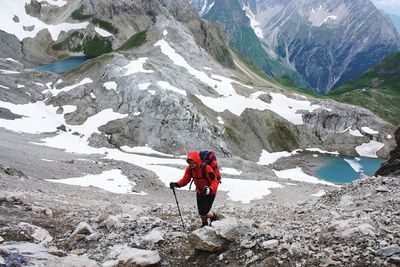 People on snowcapped mountain