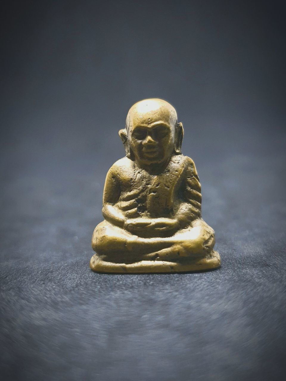 yellow, sculpture, monument, art, statue, no people, macro photography, indoors, human representation, studio shot, religion, spirituality, single object, representation, close-up, gold, metal