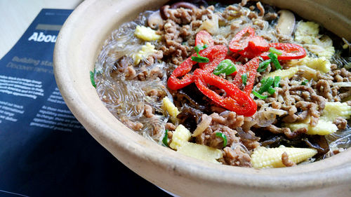 Close-up of beef noodles soup in bowl on table