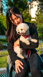 Portrait of woman with teddy bear