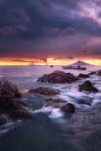 Scenic view of sea against sky during sunset