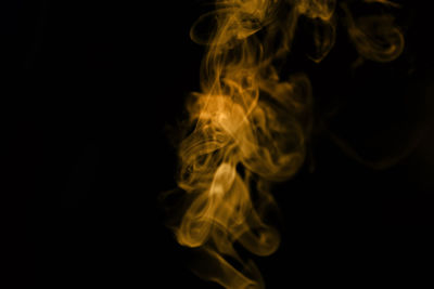 Close-up of fire against black background