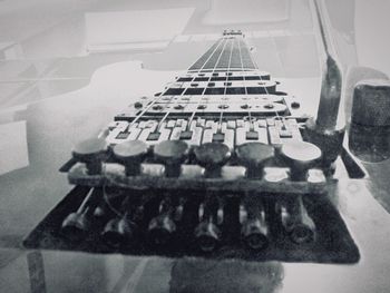 High angle view of guitar on table