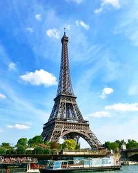 View of tower against cloudy sky