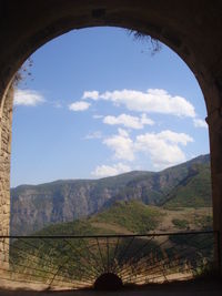Scenic view of landscape against cloudy sky