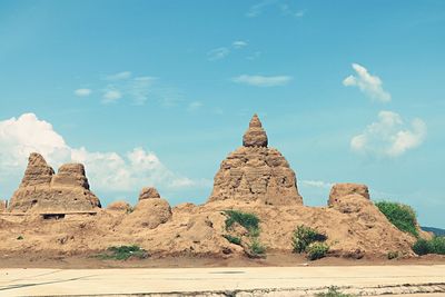 Panoramic view of rock formations against sky