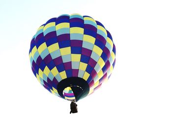 Low angle view of hot air balloon against clear sky