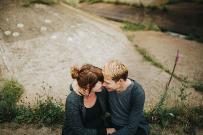 Couple holding hands outdoors