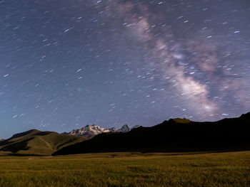 Scenic view of star field against sky at night