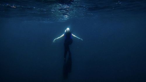 Man swimming in sea