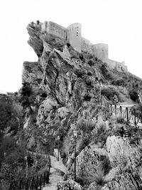 Low angle view of old ruins against sky