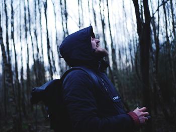 Side view of a man in the forest