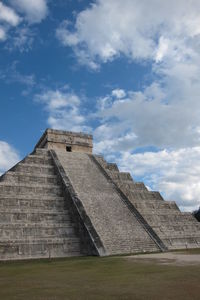 Low angle view of chichen itza against sky