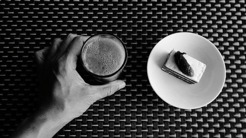 Directly above shot of coffee cup on table