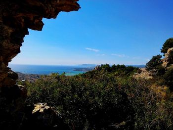 Scenic view of sea against blue sky