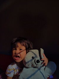 Portrait of boy wearing mask