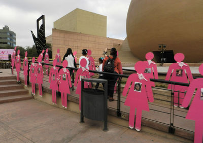 Group of people standing in front of building