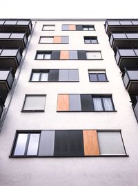 Low angle view of modern building against clear sky